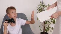 Computer games addiction. Boy Doesn"u2019t Want to Learn and Read a book