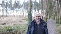 Active senior man in the woods