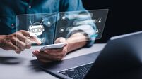 AI chat technology, Businessman use smartphone with virtual screen of AI chatbot communicate and answer questions. Artificial in