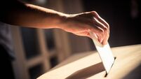 Conceptual image of a person voting during elections