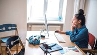 iStock-1456230934.jpg teenage girl sitting in front of computer at desk