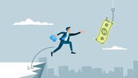 Option - iStock-2226274152.jpg Businessman jumping towards dollar bill banknote on hook