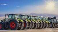 Exhibition / new tractors lined up next to each other in a row
