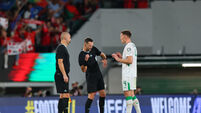 Dara O'Shea protests with referee after the match  11/10/2025