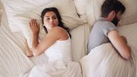 Couple, fight and woman with man sleeping in bed, conflict or marriage issue with trouble or upset at home. Awake, above annoyed