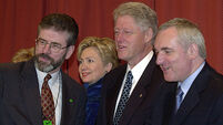 State Papers: White House did not want photo of Clinton shaking hands with Adams