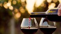 Pouring red wine