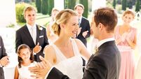 iStock-471863303.jpg People Applauding While Looking At Couple Dancing