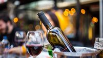 red wine on young adults valentines day table