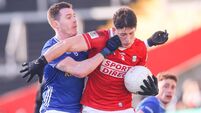 Colm O'Callaghan is challenged by Ciaran Brady 25/1/2026