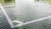 Flooding in artificial grass football field