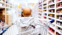 Little baby boy at the supermarket.