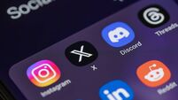 New social media apps formerly twitter  x and threads on smart phone screen