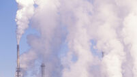 Pollution from smokestacks filling the air at the Boise Cascade Paper Plant in Rumford Maine