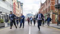 'I'll remember to bring my runners next time': Cork City traffic stops for pancake race