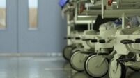Hospital corridor with gurneys