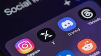 New social media apps formerly twitter  x and threads on smart phone screen