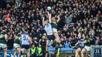 Peadar Ó Cofaigh Byrne and Joe O'Connor compete in the air for the ball  21/2/2026
